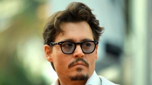 Johnny Depp canta il processo: la canzone sulla rottura con Amber