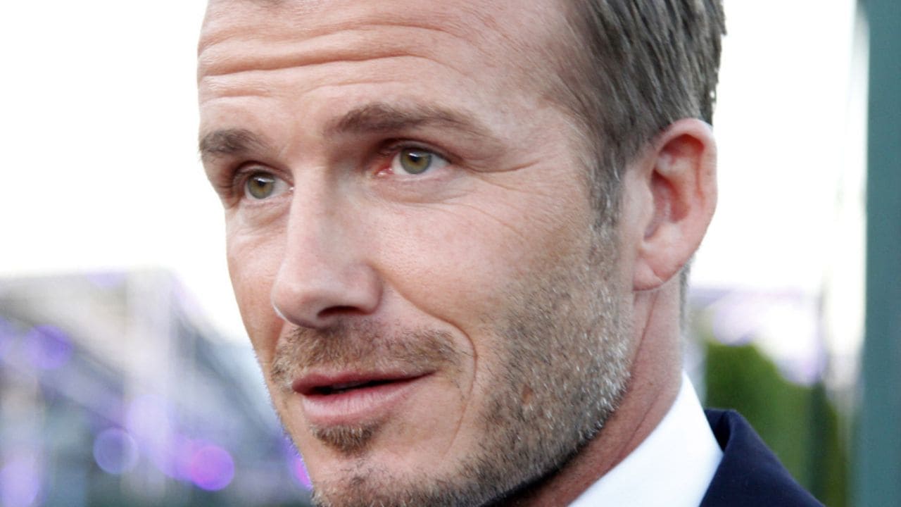 David Beckham fisico costume Positano