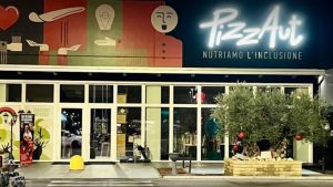 Una pizza per combattere i bulli: PizzAut lancia la “Gnè Gnè”