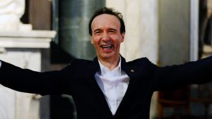 Roberto Benigni a Sanremo, è polemica: “La Rai renda pubblico il compenso”