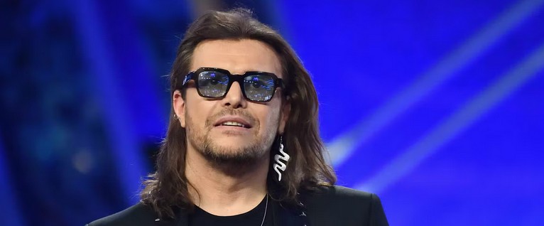 Pausini, Grignani e la "Guerra" delle Cover: Tutta la Verità Dietro lo Scontro Discografico 42 gianluca grignani 1